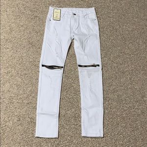White ripped jeans with zippers